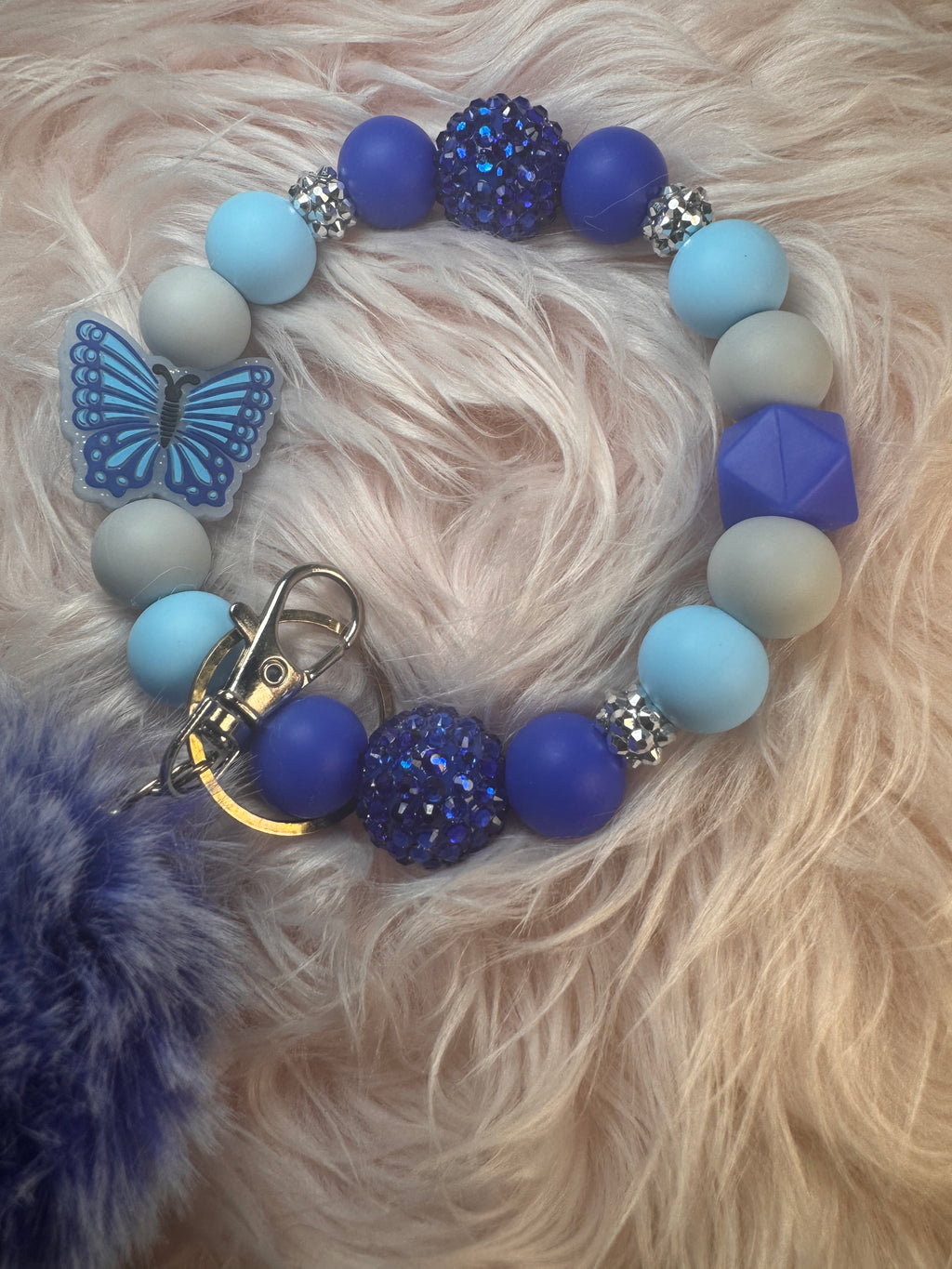 Flutters serine wristlet