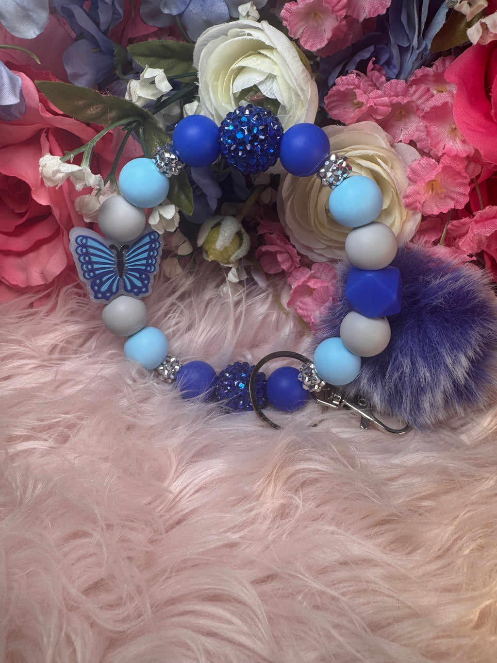 Flutters serine wristlet