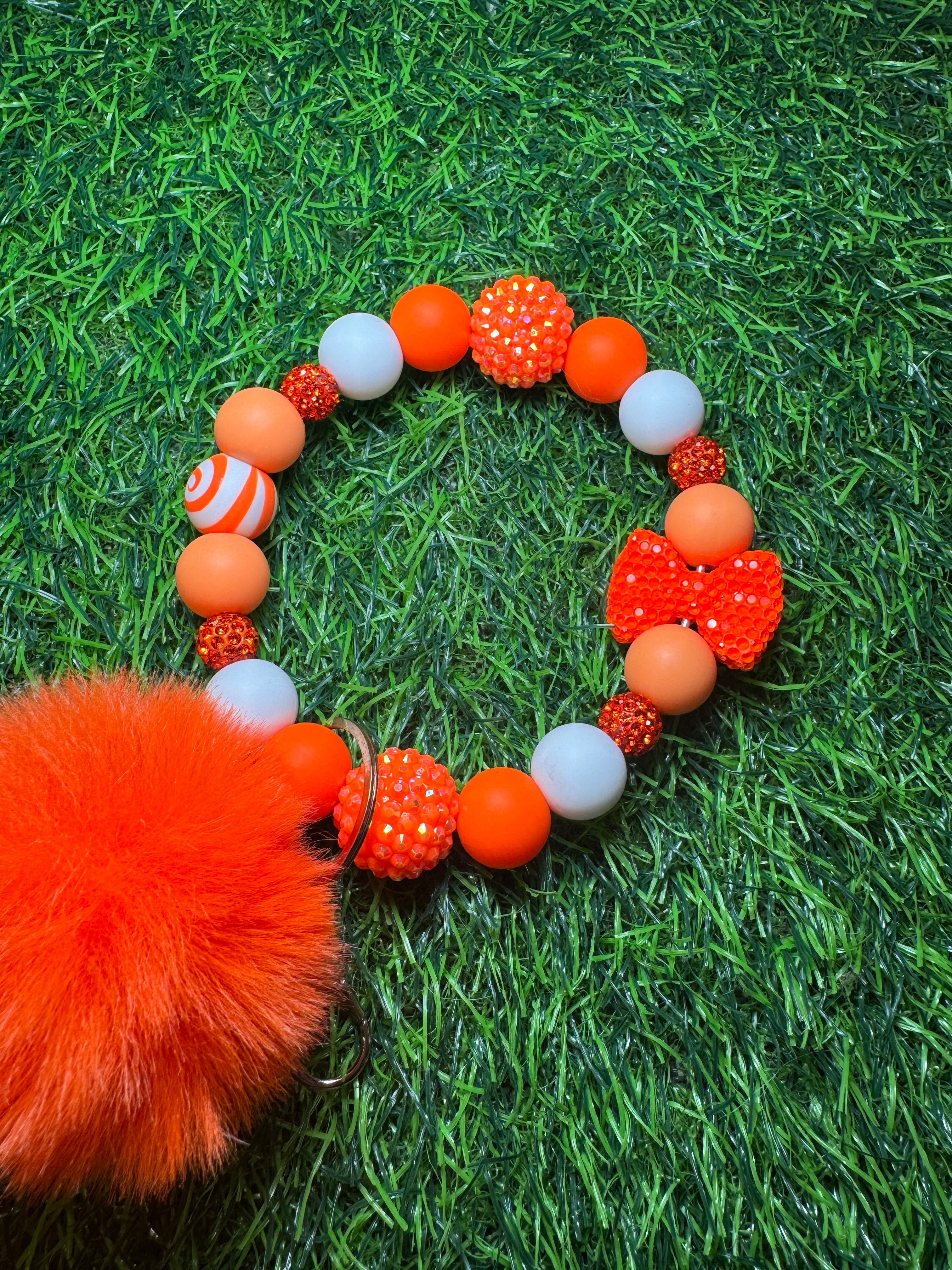 Tangerine swirl wristlet