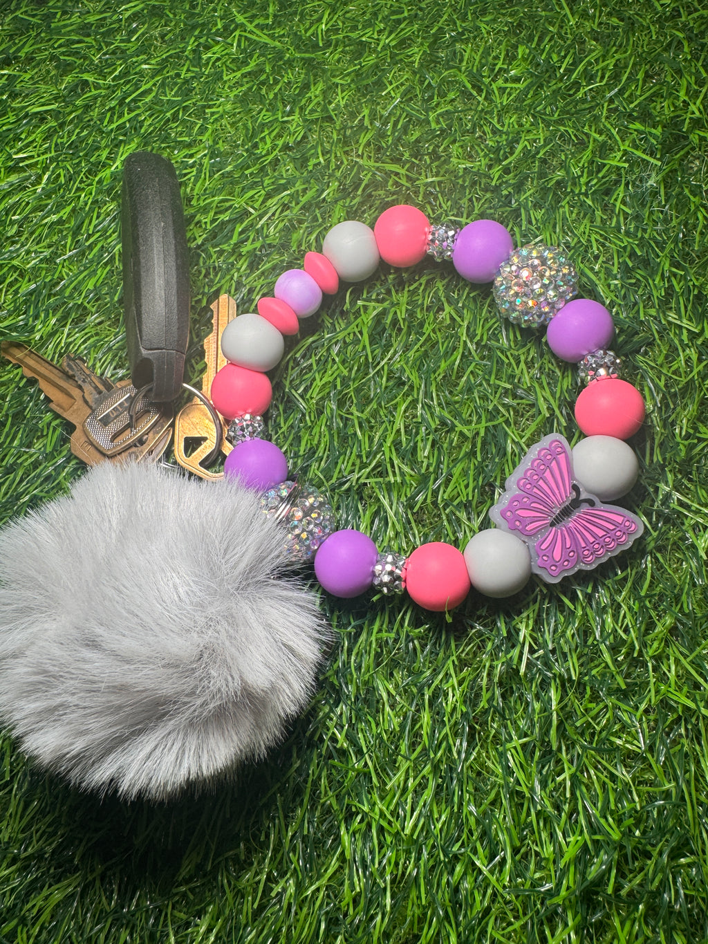 Girly girl flutters wristlet