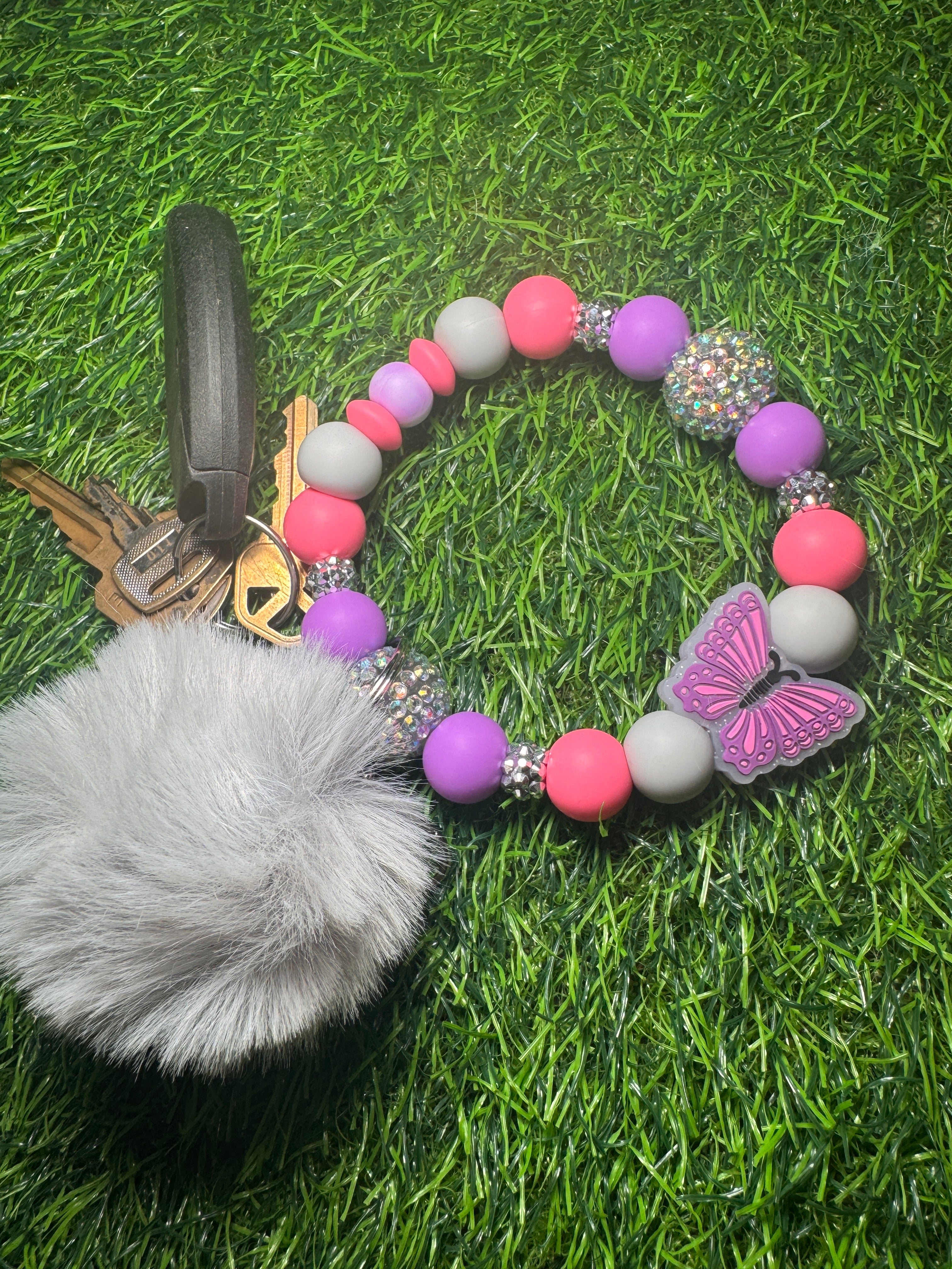 Girly girl flutters wristlet
