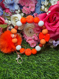 Tangerine swirl wristlet