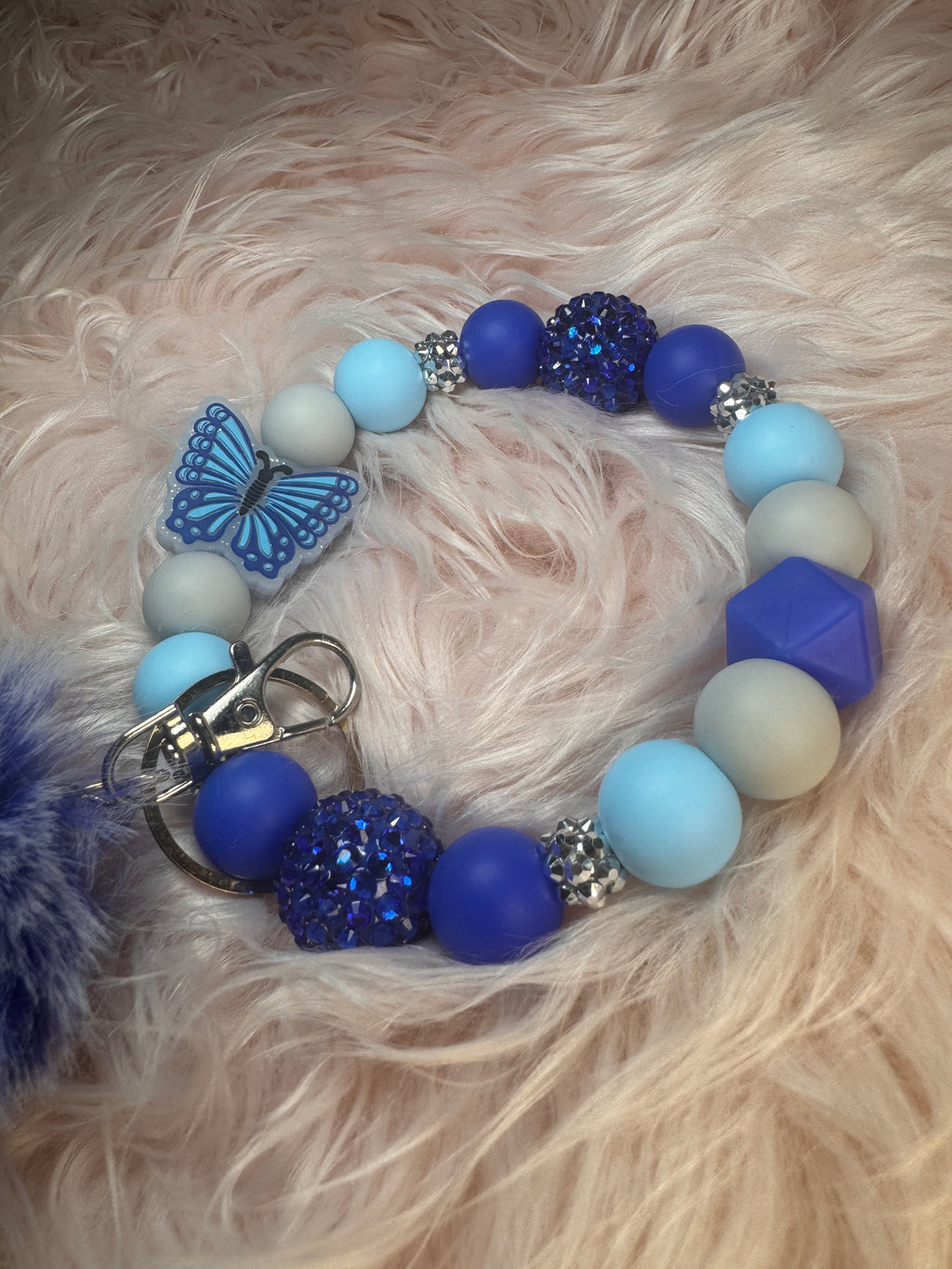 Flutters serine wristlet