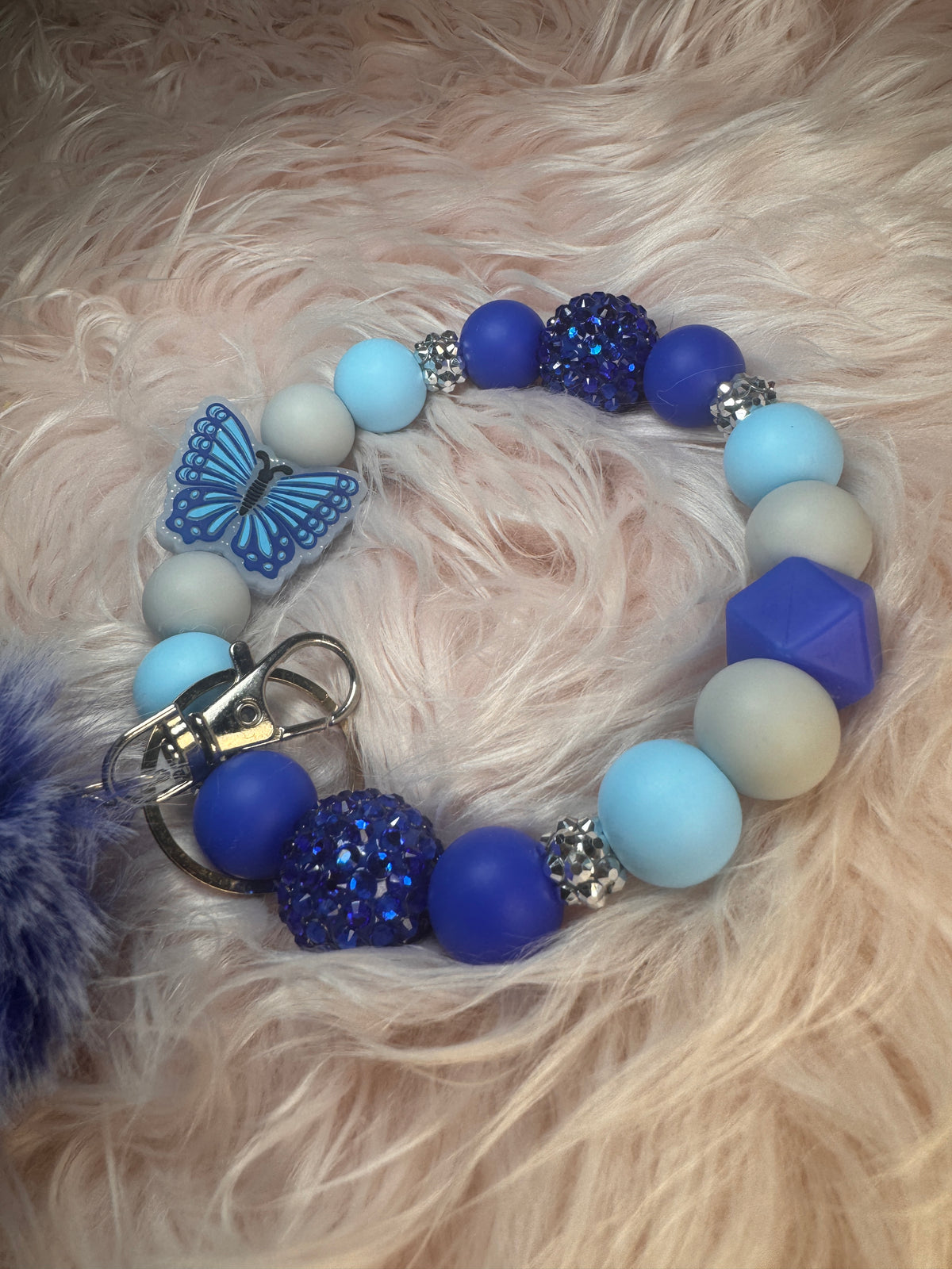 Flutters serine wristlet