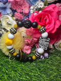 Smooth daisy wristlet