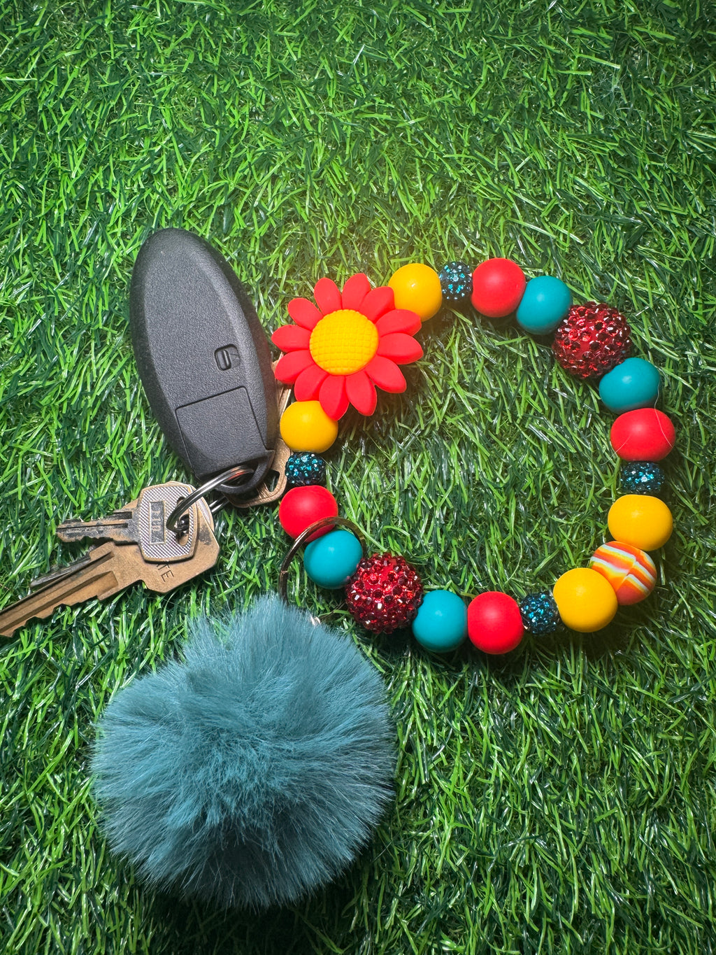 Flame in bloom wristlet
