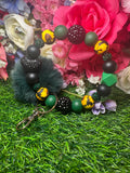 Emerald bloom wristlet