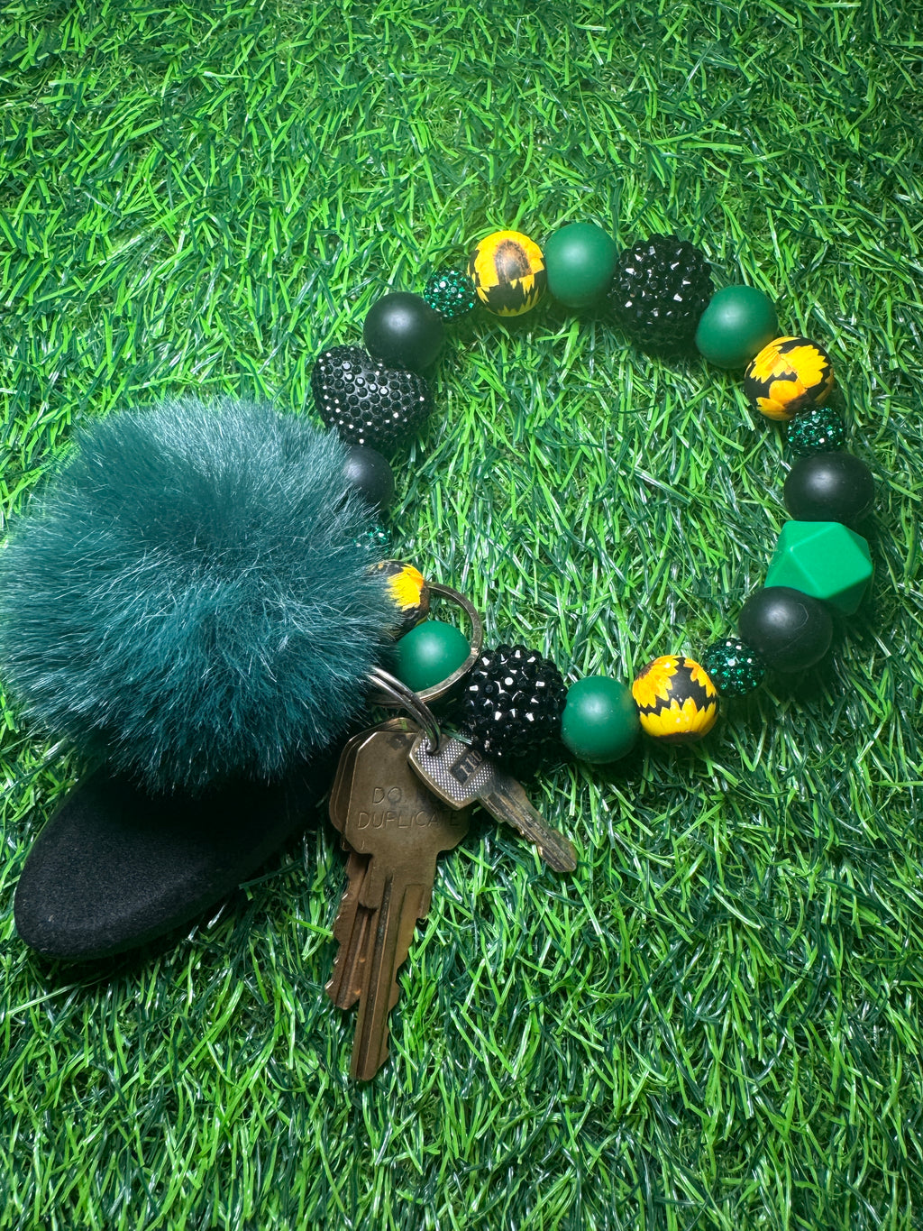 Emerald bloom wristlet